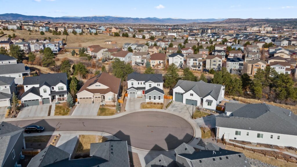 A drone view of a high end luxury home in Castle Rock, Colorado