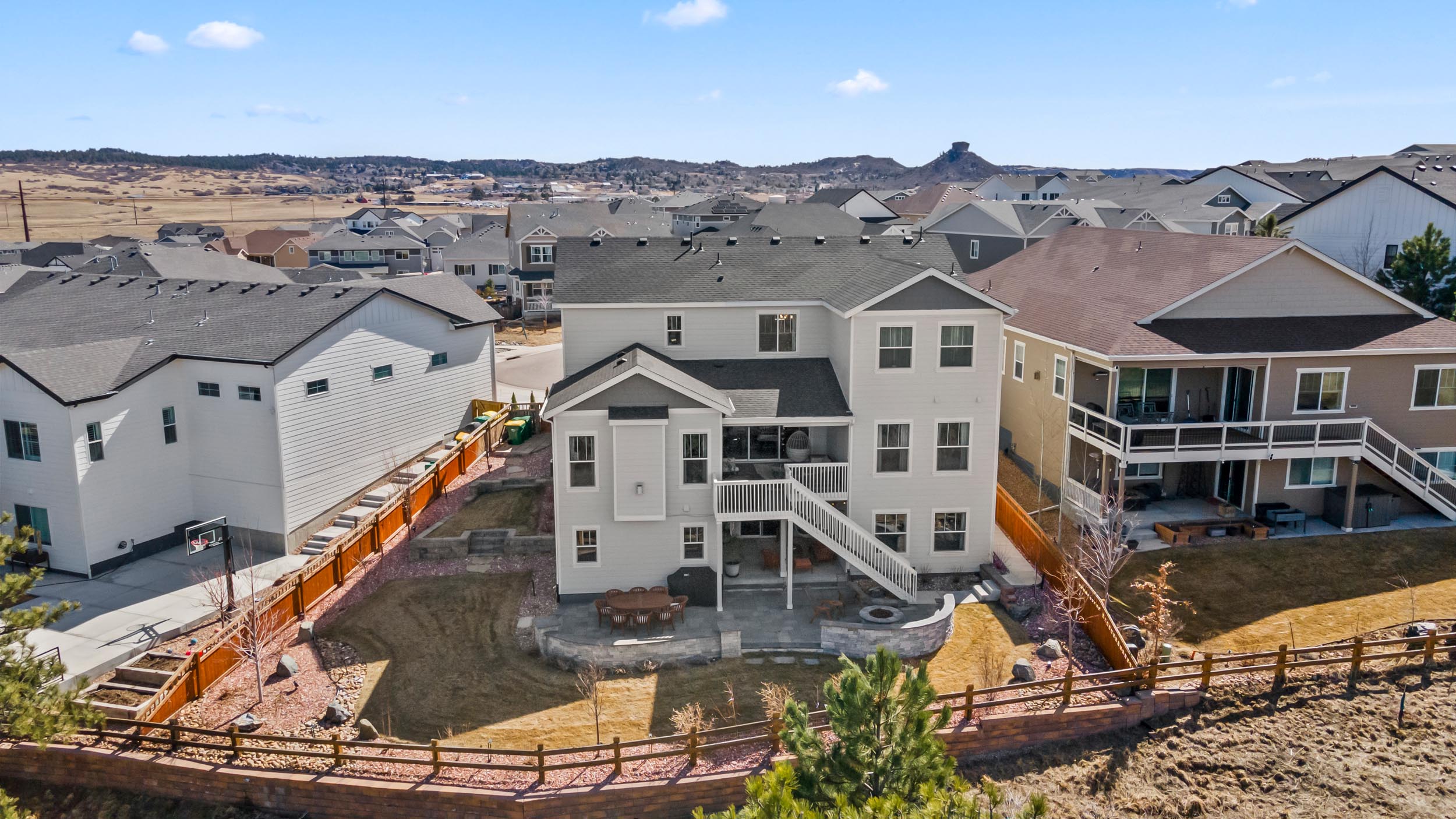 A drone view of the back yard of a high end luxury home in Castle Rock, Colorado