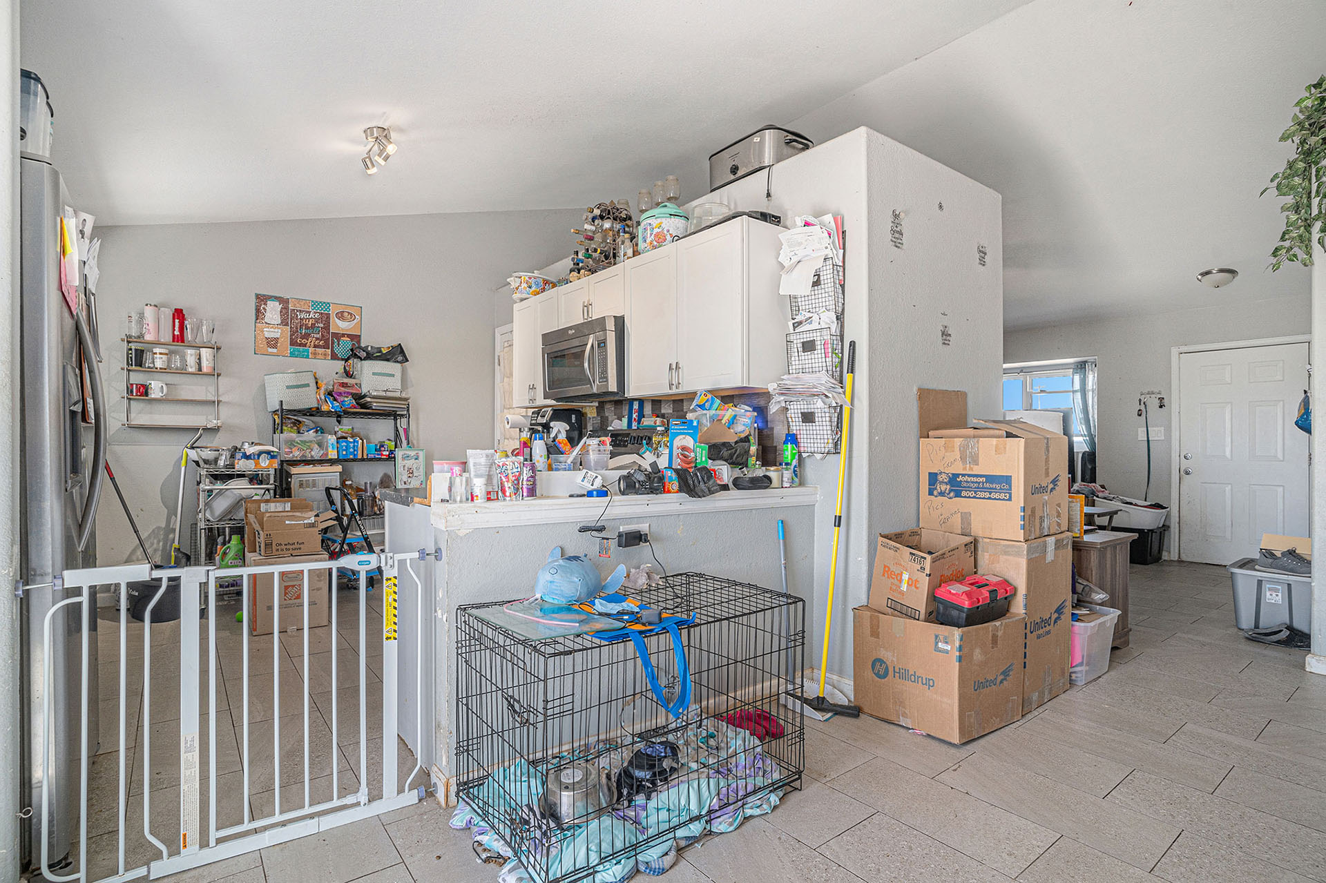 Bad Real Estate Photo of Cluttered Kitchen