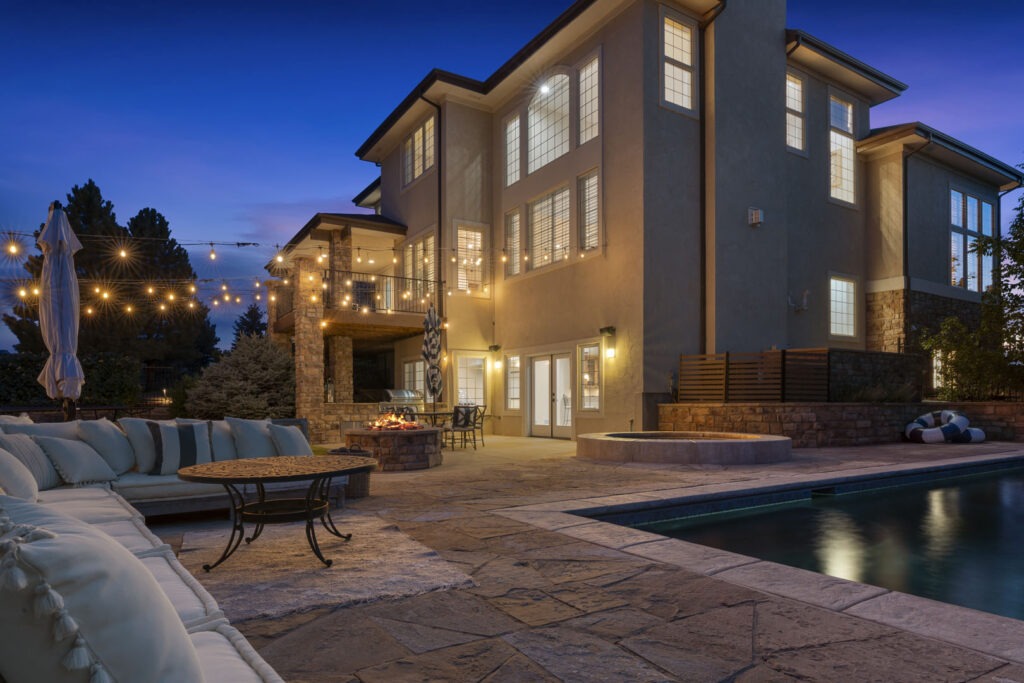 True Twilight Photograph of a Luxury Home with A Pool