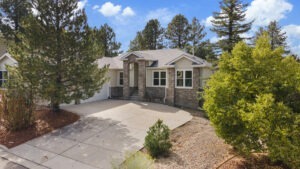 Drone photography capturing the front of a luxury Castle Rock real estate listing.