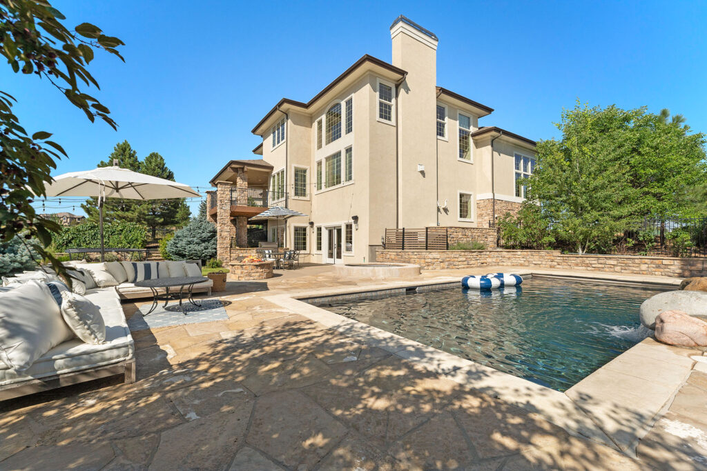 Luxury real estate listing of a home in Castle Rock showcasing the pool.