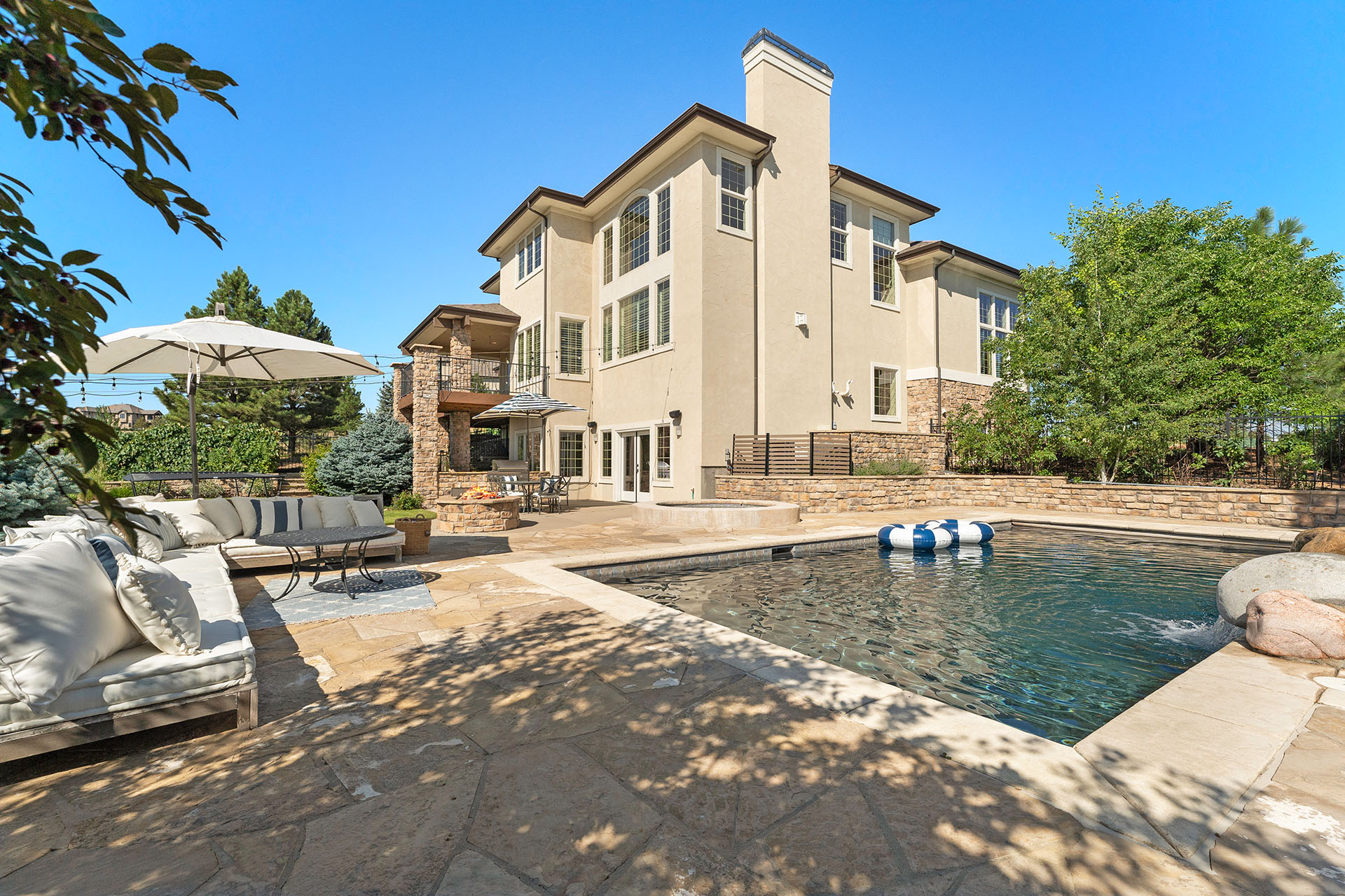 Luxury real estate listing of a home in Castle Rock showcasing the pool.